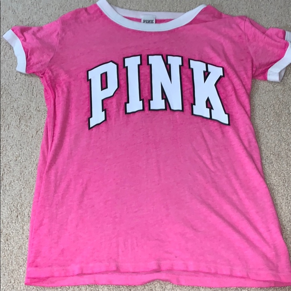 A pink T-shirt from pink the back is all pink.
